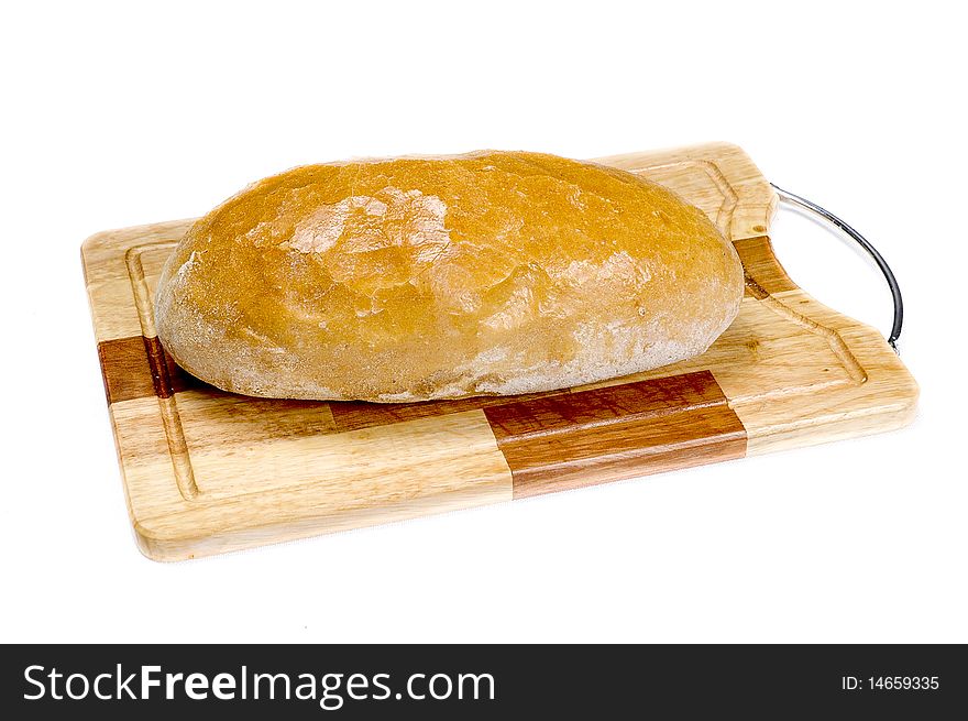 Fresh bread on a wooden board