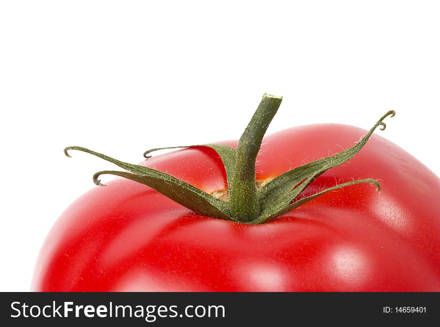 One tomato fragment macro shot isolated over white background