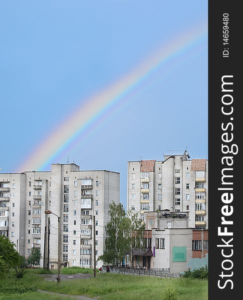 Rainbow on a background houses