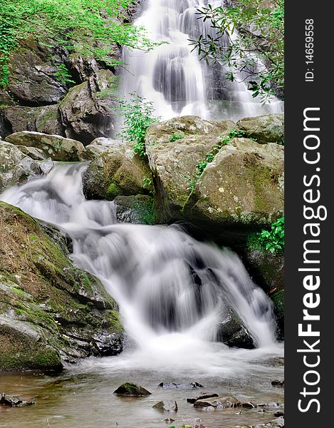 Beautiful Spruce Flat Falls in Great Smoky Mountains Natonal Park, after the spring rains. On the border of North Carolina and Tennessee. Beautiful Spruce Flat Falls in Great Smoky Mountains Natonal Park, after the spring rains. On the border of North Carolina and Tennessee.