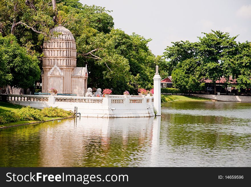 Thai style stupa to jut out in to the pond, Ayutthaya Thailand. Thai style stupa to jut out in to the pond, Ayutthaya Thailand