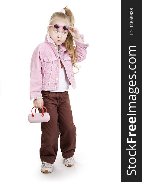 The fashionable little girl wearing sun glasses. The fashionable little girl wearing sun glasses