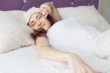 Free An Attractive Young Brunette Girl Woman Wakes Up In Her Bed In A Sleep Mask. Royalty Free Stock Photo - 146500045