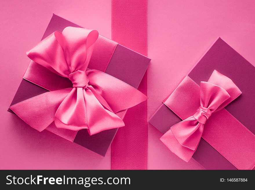 Baby shower girl, celebration, present concept - Pink gift boxes, feminine style flatlay background