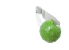 A Lime Cut By A Chefs Knife Royalty Free Stock Images