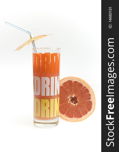 Red grapefruit juice in the glass isolated on white background
