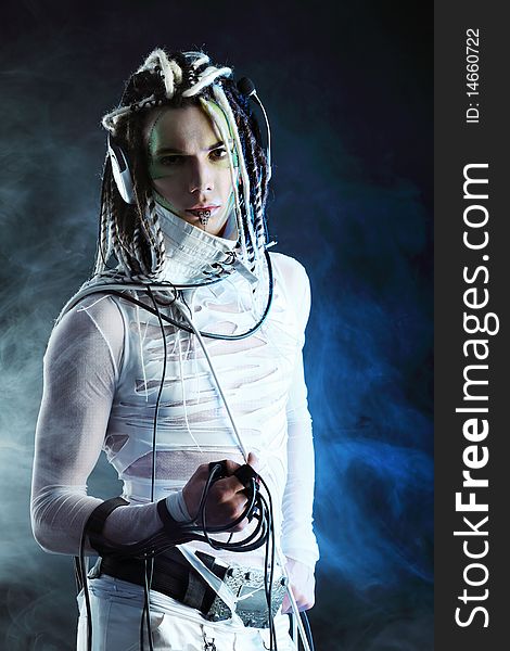 Shot of a futuristic young man with wires. Shot of a futuristic young man with wires.