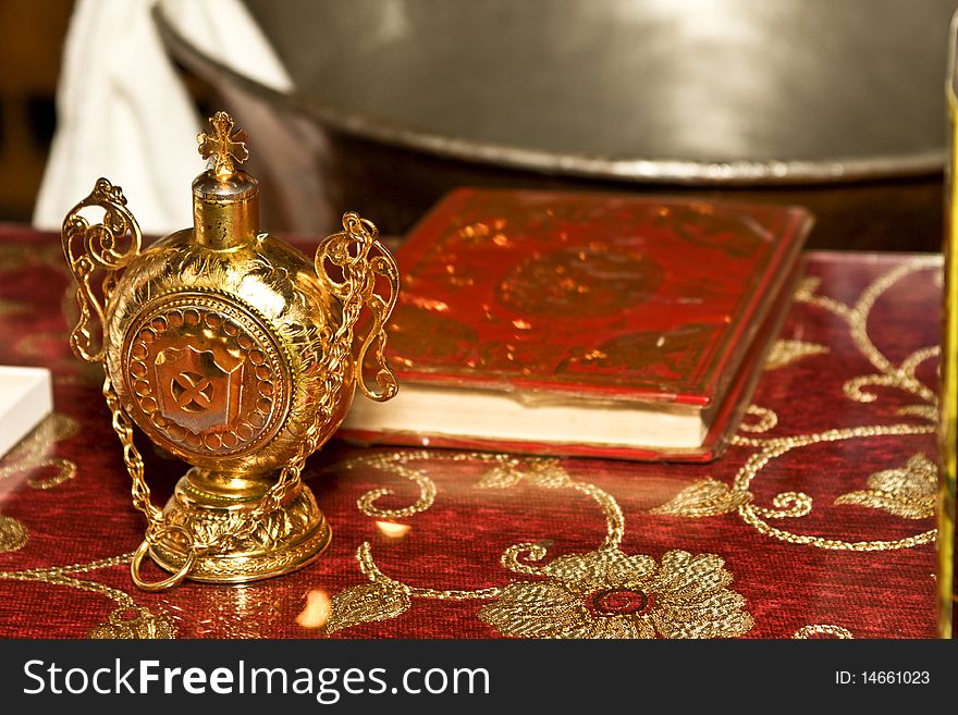 Holy Book, baptistery and a chrismatory found on an altar inside a Greek Orthodox church
