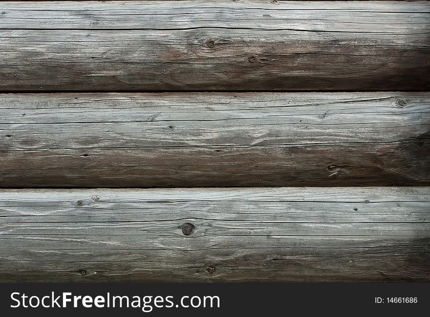 Three Old Baulks - fragment of wooden wall. Three Old Baulks - fragment of wooden wall