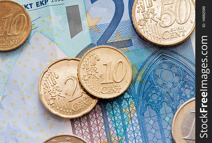Euro Banknotes and coins closeup. Euro Banknotes and coins closeup.