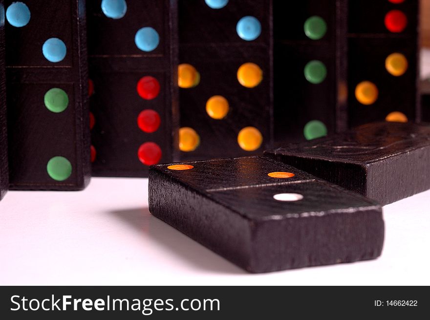 Colored domino tiles on white background