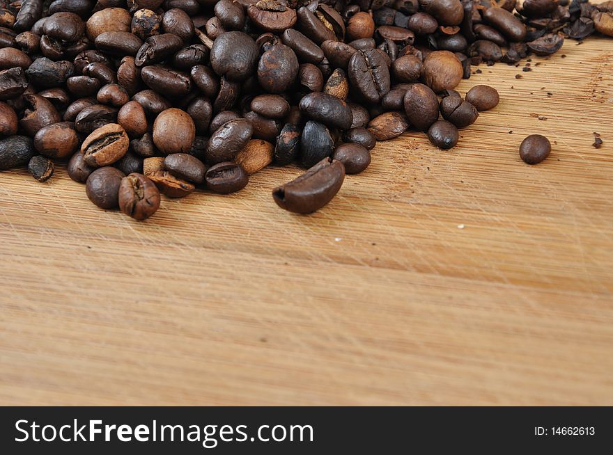 Coffee Granules On Wood Desk