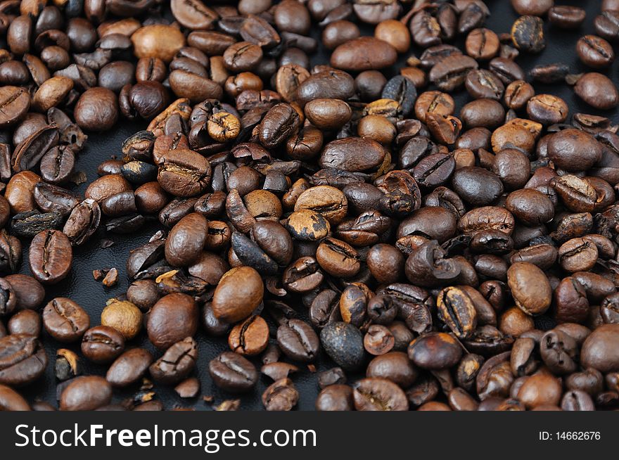 Coffee granules on black table