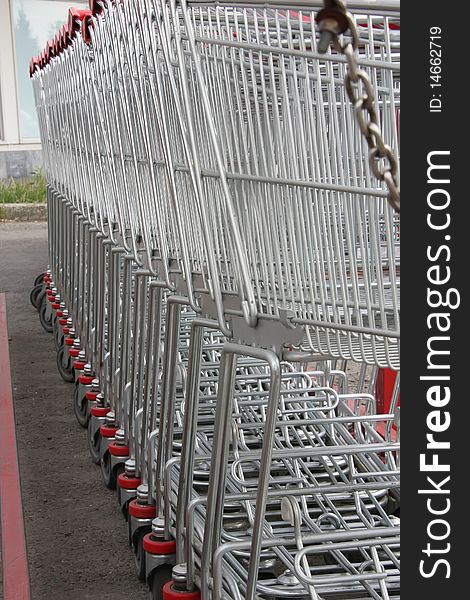 Lot of Shopping Carts in a supermarket's park.