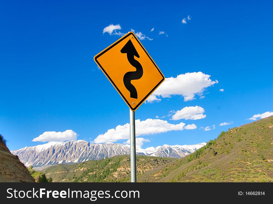 Curve road sign in Colorado Rockies. Curve road sign in Colorado Rockies
