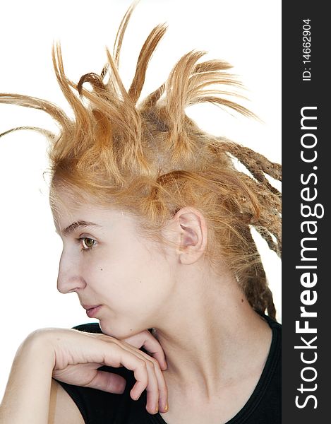 Young girl with a strange hairdo on a white background