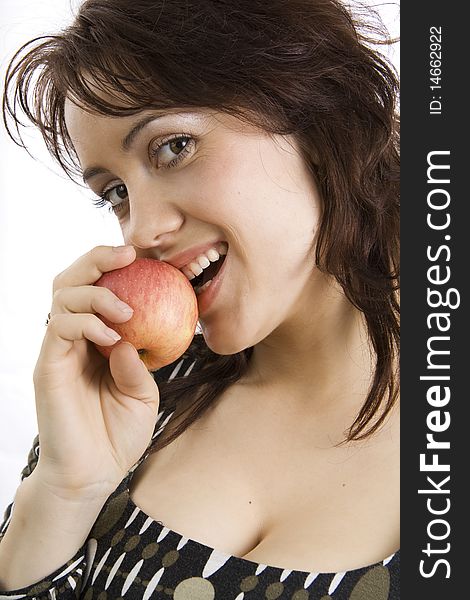 Woman eats an apple