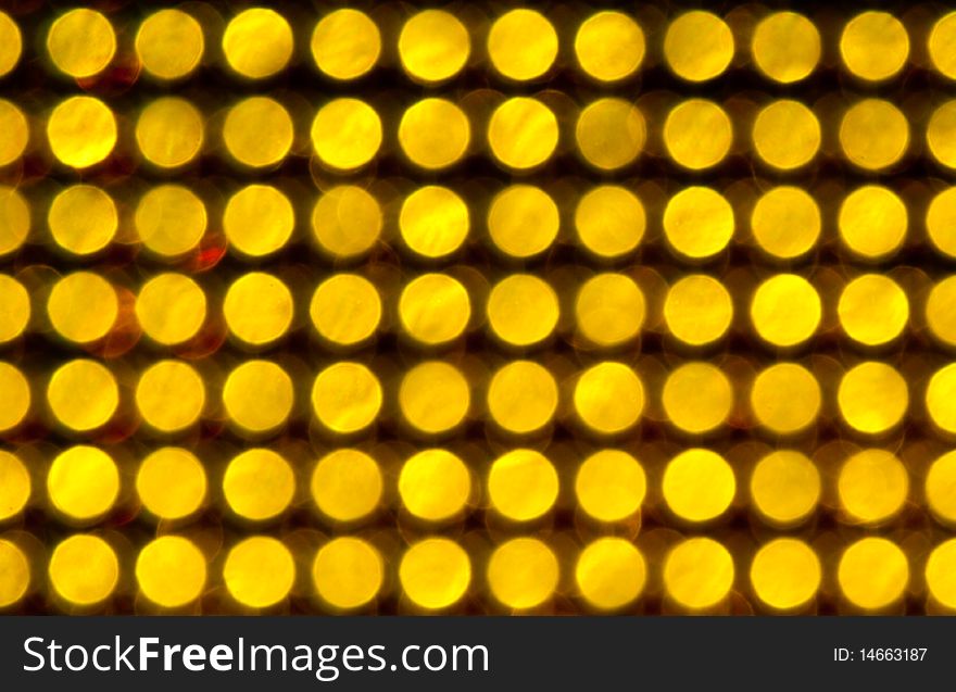 Blurry pattern of yellow decoration lights. Blurry pattern of yellow decoration lights.