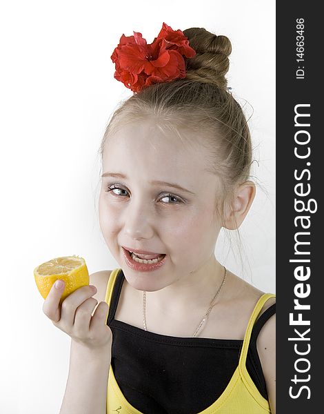 Girl Eating An Lemon