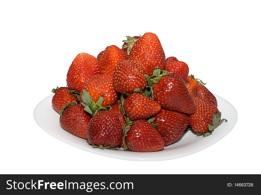 Strawberry on a plate on a white background