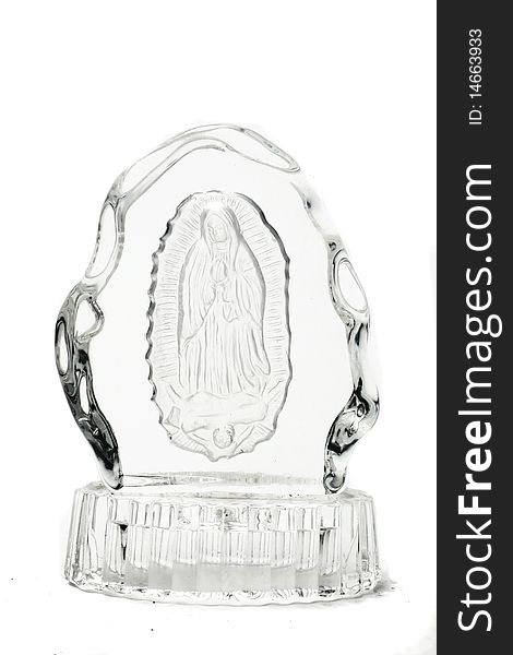 Glass sculpture of virgin Mary isolated