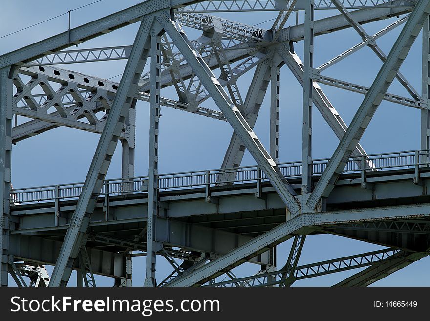 Sectional view of a steel bridge crossing. Sectional view of a steel bridge crossing.