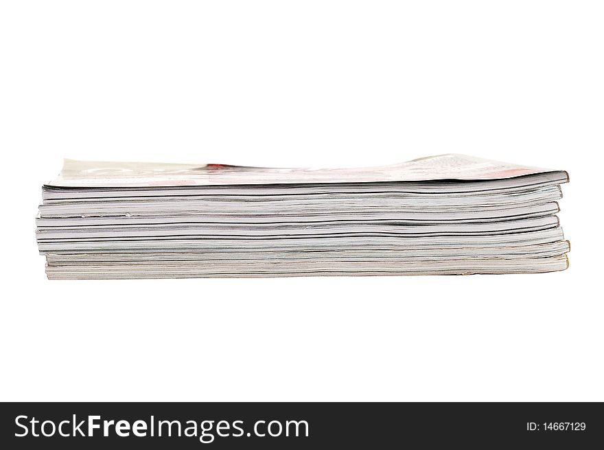 Stack of magazines isolated on a white
