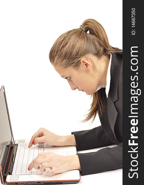 Young businesswoman is working using notebook computer. Young businesswoman is working using notebook computer
