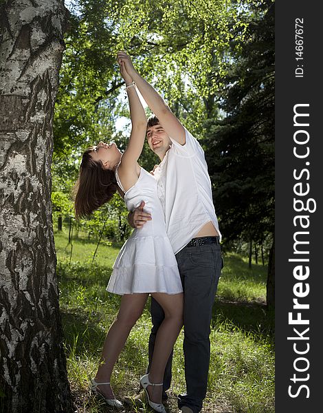 Woman and man posing in the middle of nature. Woman and man posing in the middle of nature