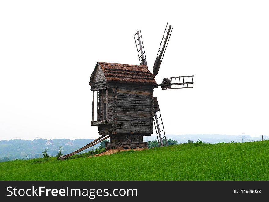 Old wind mill in a field