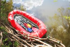 Red Inflatable Boat With Oars Raft For Rafting Along A  River Stock Photos