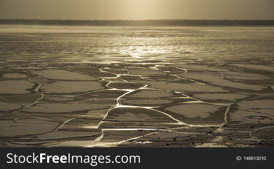 From the severe cold froze the water in Siberian river