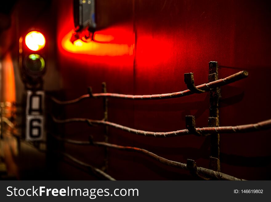 Red signal of the traffic light and wires in the subway. Composition in the museum. Moscow. Russia