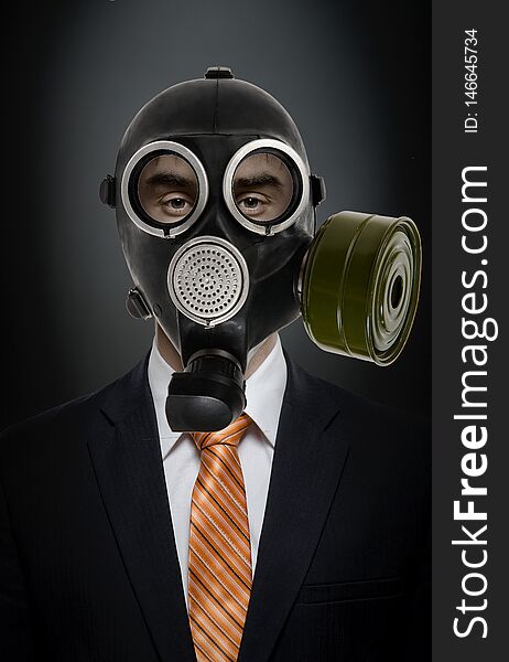 Businessman in gas mask