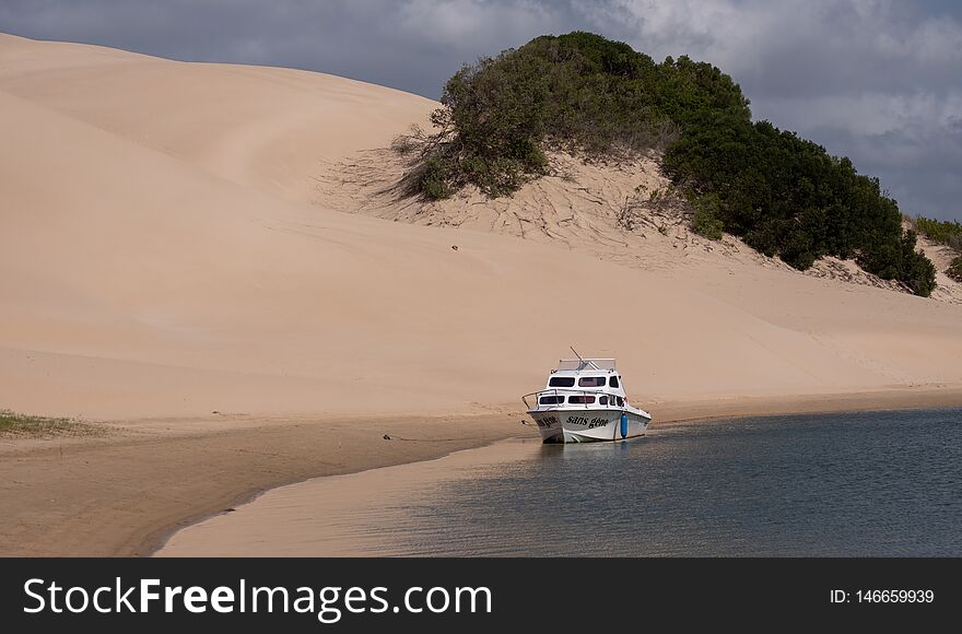 Boat moored at the Alexandria coastal dune fields near Addo / Colchester on the Sunshine Coast in South Africa.