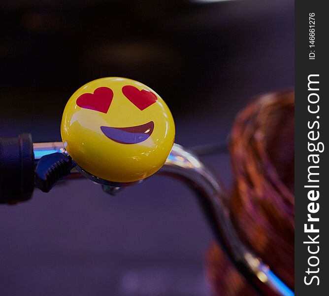 Emoji ring smile on the bicycle