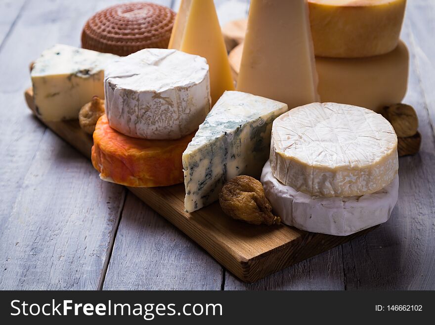 Cheese platter with blue, aged, yellow and white cheeses. Cheese platter with blue, aged, yellow and white cheeses