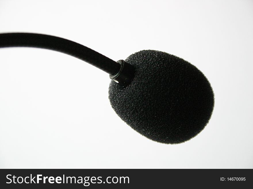 Close up of a headset micro on white background. Close up of a headset micro on white background