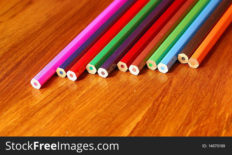 Coloring pencils spread out on a table