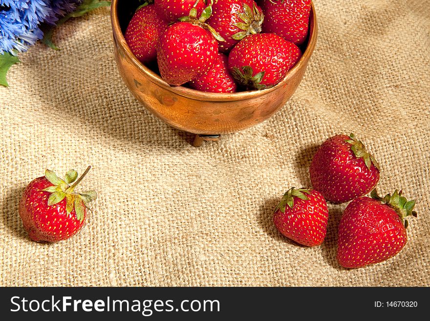 Still-life with strawberry and cornflowers