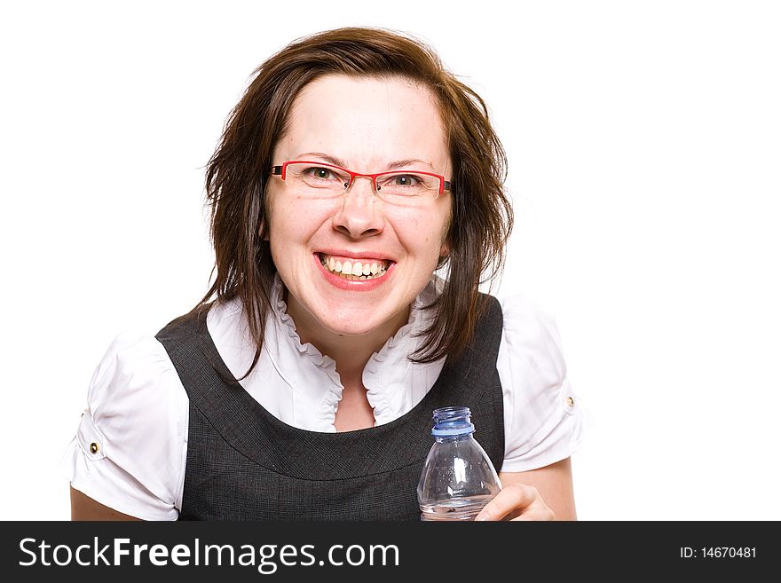 Young attractive and very happy female office worker holds bottle of water, studio shoot isolated on white background. Young attractive and very happy female office worker holds bottle of water, studio shoot isolated on white background