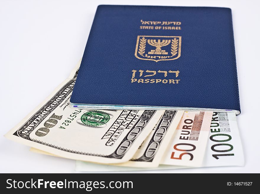 Israeli passport and dollar bills isolated on white with cliping path