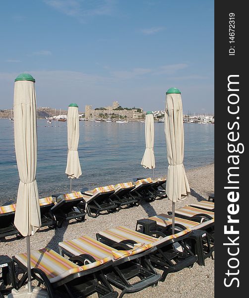 Seats and parasols at the beaches of bodrum,turkey. Seats and parasols at the beaches of bodrum,turkey