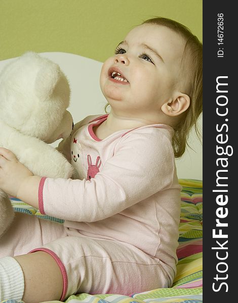 Baby girl with teddy bear