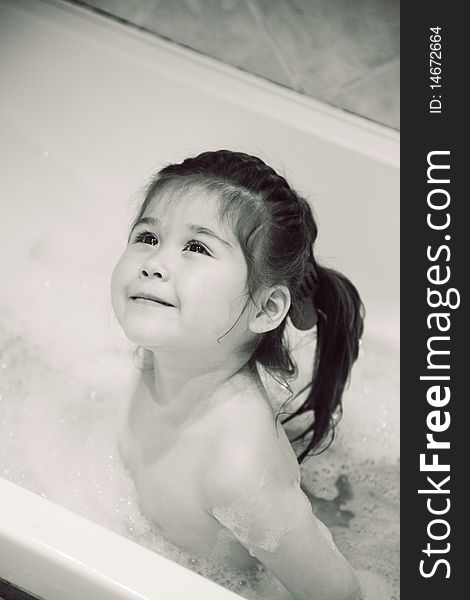 Girl taking bath with bath foam (bw). Girl taking bath with bath foam (bw)