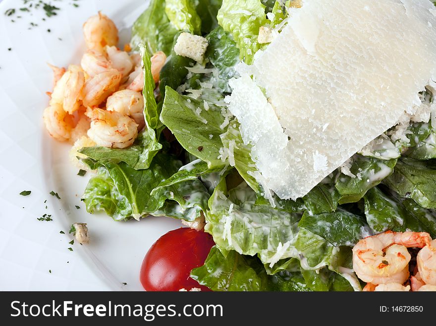 Salad  caesar  with shrimps on plate
