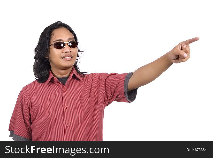 Long hair man with sunglasses pointing something isolated on white background