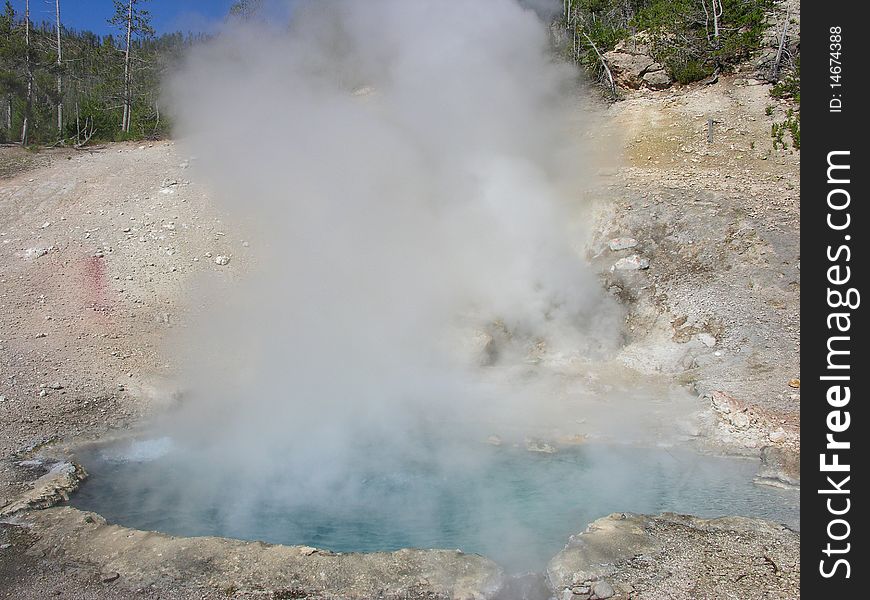 Smoky Geyser in the Yellowstone National Park. Smoky Geyser in the Yellowstone National Park