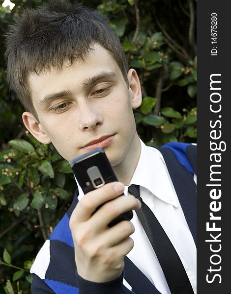 Teenager Looking At Mobile Phone