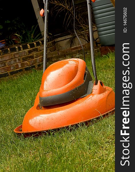 Garden hover lawn mower on grass